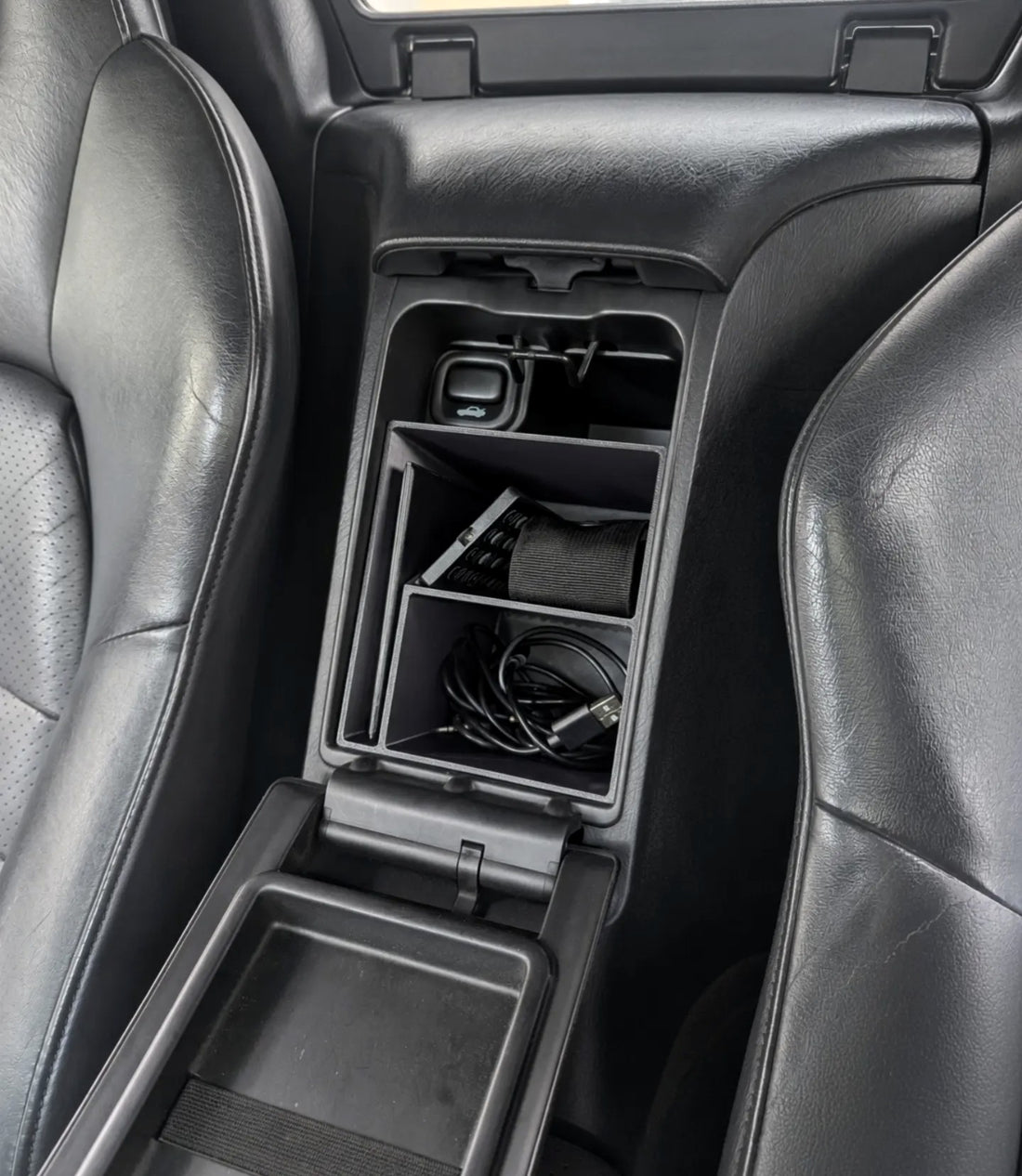 Honda S2000 Glove Box Organizer Document Slot in the S2000 center console holding a pouch and cables